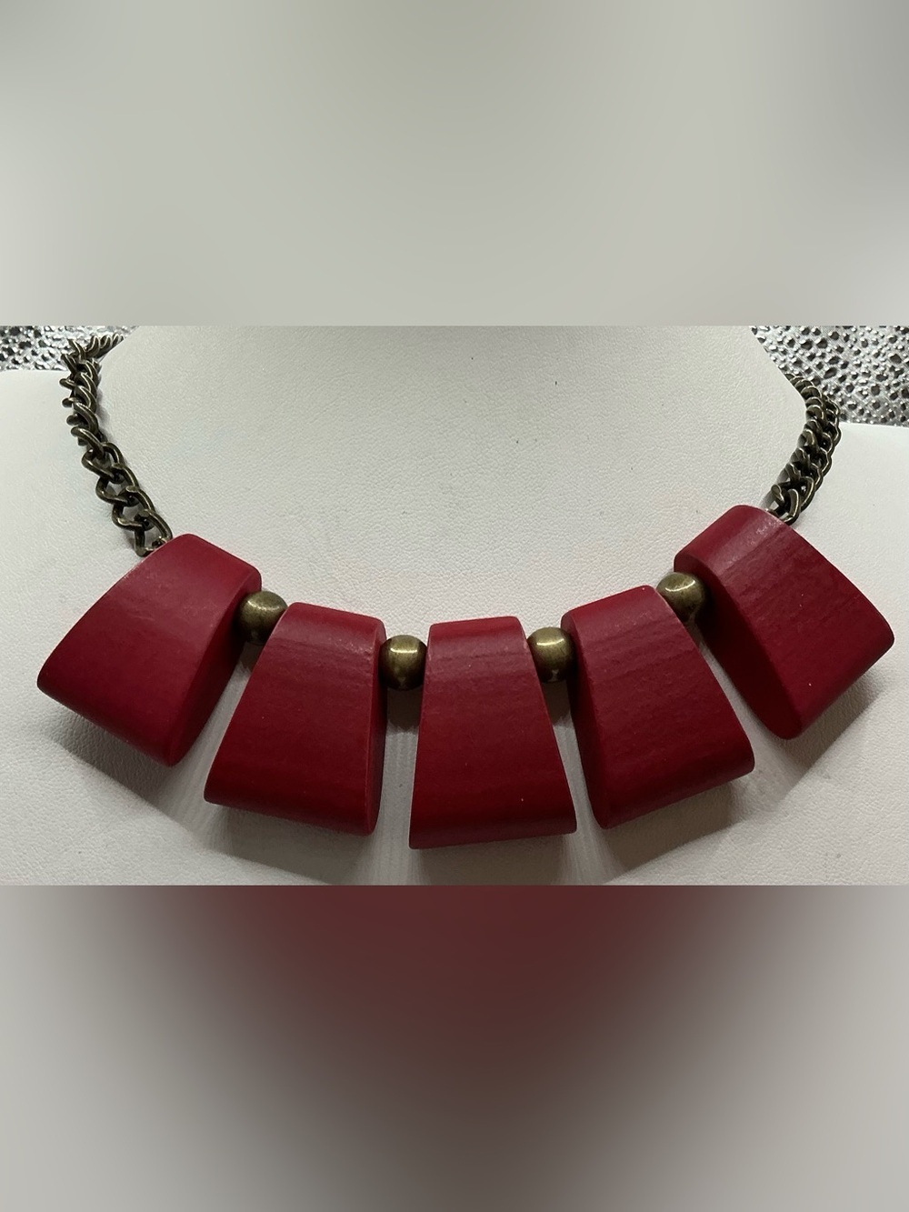 PLUNDER RED WOODEN AND METAL STATEMENT NECKLACE